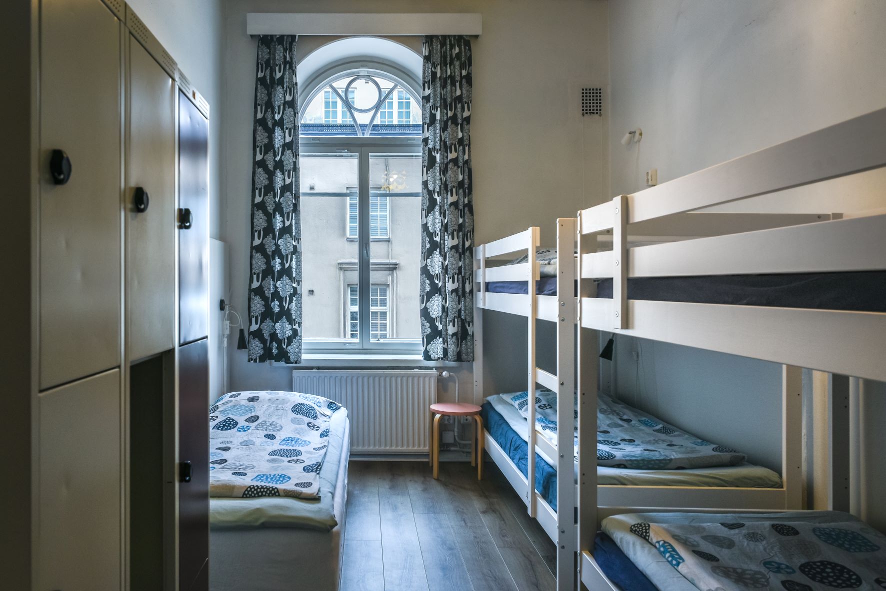 Clean bunk beds in a bright female-only dorm room at Hostel Diana Park